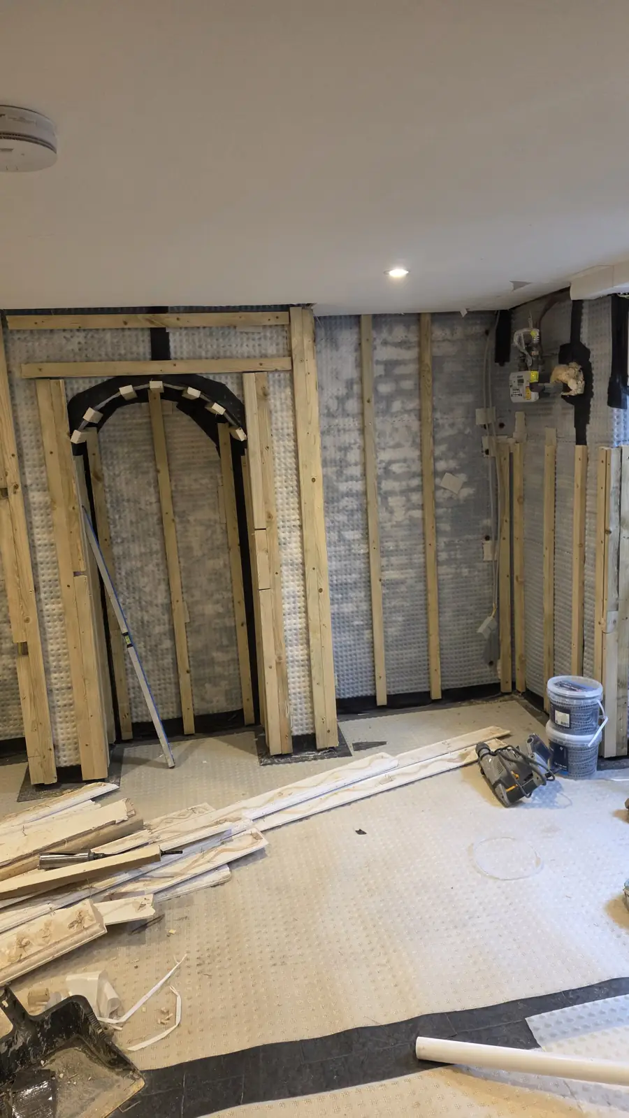Cavity drain membrane fixed to cellar walls with timber battens ready for boarding, Faversham